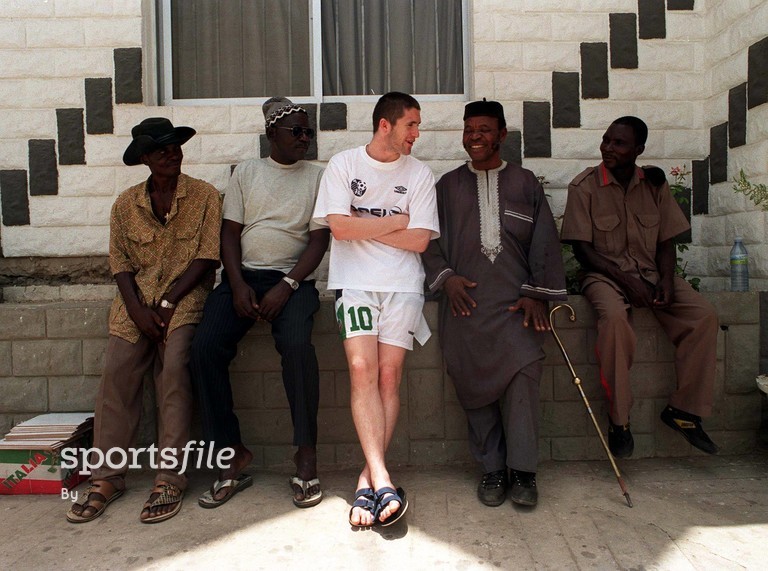 30 March 1999; (centre) Robbie Keane, Republic of Ireland, talks to locals in Ibadan, Nigeria. FIFA World Cup U-20 tournament. Soccer. Picture credit; David Maher/SPORTSFILE