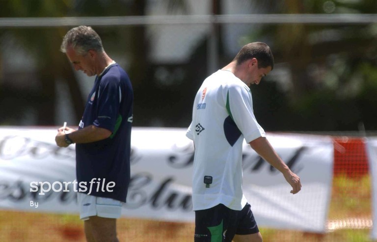 22 May 2002; Republic of Ireland captain Roy Keane walks past manager Mick McCarthy during squad training. Adagym, Saipan. Soccer. Cup2002. Picture credit; David Maher / SPORTSFILE *EDI*