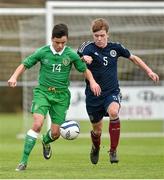 25 January 2015; Jordan Doherty, Republic of Ireland, in action against Kieran Freeman, Scotland. U15 Soccer International, Republic of Ireland v Scotland, Pat Kennedy Park, Tanavalla, Listowel, Co. Kerry. Picture credit: Brendan Moran / SPORTSFILE