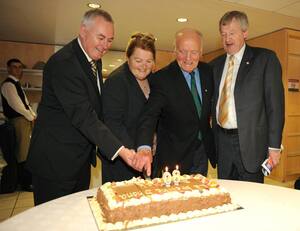 9 August 2009; Former GAA President and Mayo footballer Dr. Mick Loftus cuts a cake presented to him on the occasion of his 80th birthday with his wife Eidie, Uachtar&aacute;n Chumann L&uacute;thchleas Gael Criost&oacute;ir &Oacute; Cuana, left, and Ard Sti&uacute;rthoir Paraic Duffy, right. Dr. Mick Loftus Celebrates 80th Birthday, Croke Park, Dublin. Picture credit: Ray McManus / SPORTSFILE - read more