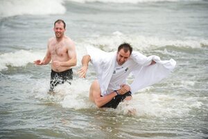 30 October 2011; Vice-captain Ciaran McKeever looks on as  Karl Lacey is tackled by Darren Hughes when members of the Ireland  International Rules Series 2011 team splash about on St Kilda Beach, Melbourne Bay, Australia. Picture credit: Ray McManus / SPORTSFILE - read more