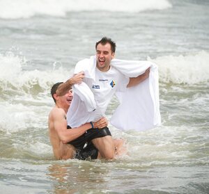 30 October 2011; Karl Lacey is tackled by Darren Hughes as members of the Ireland  International Rules Series 2011 team splash about St Kilda Beach, Melbourne Bay, Australia. Picture credit: Ray McManus / SPORTSFILE - read more