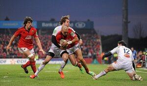14 January 2012; Simon Zebo, supported by Donncha O'Callaghan, Munster, is tackled by Paul Bonnefond, Castres Olympique. Heineken Cup, Pool 1, Round 5, Munster v Castres Olympique, Thomond Park, Limerick. Picture credit: Diarmuid Greene / SPORTSFILE - read more