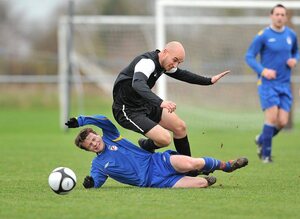 28 February 2012; Stephen McDonnell, Drogheda Institute of FE,slide tackles Colm Barron, IT Carlow 'C'. Umbro CUFL Division Two Final, Drogheda Institute of FE v IT Carlow 'C', Greenogue, Peamount United FC, Peamount, Dublin. Picture credit: Barry Cregg / SPORTSFILE - read more
