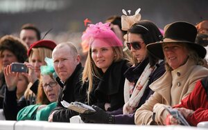 14 March 2012; Racegoers look on during the sportingbet.com Queen Mother Champion Steeple Chase at the Cheltenham Festival. Cheltenham Racing Festival, Prestbury Park, Cheltenham, England. Picture credit: Brendan Moran / SPORTSFILE - read more