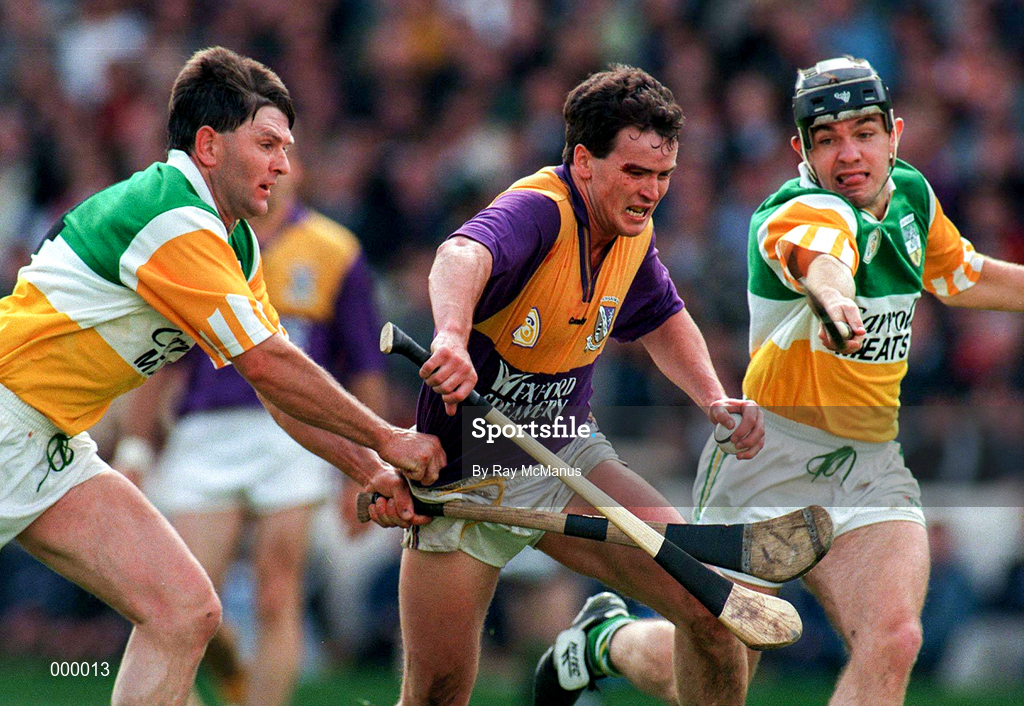 22 June 1997; Adrian Fenlon of Wexford, in action against Colm Cassidy, right, and Martin Hanamy of Offaly during the GAA Leinster Senior Hurling Championship Semi-Final match between Wexford and Offaly at Croke Park in Dublin. Photo by Ray McManus/Sportsfile