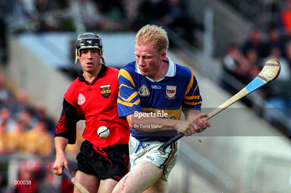 26 July 1997; Aidan Ryan of Tipperary in action against Stephen Murray of Down during the GAA All-Ireland Senior Hurling Championship Quarter-Final match between Tipperary and Down at St. Tiernach's Park in Clones, Monaghan. Photo by David Maher/Sportsfile