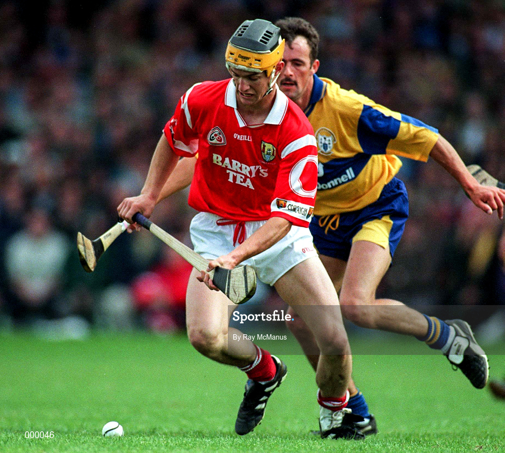 8 June 1997; Alan Cummins of Cork in action against PJ O'Connell of Clare during the GAA Munster Senior Hurling Championship Semi-Final match between Clare and Cork at the Gaelic Grounds, Limerick. Photo by Ray McManus/Sportsfile