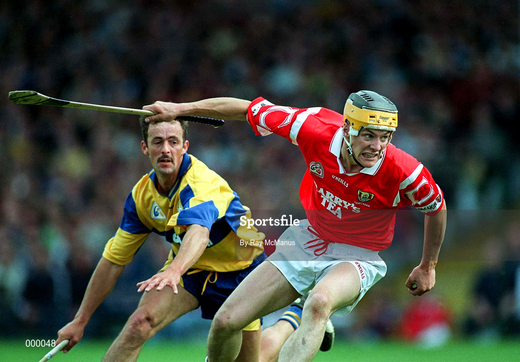 8 June 1997; Alan Cummins of Cork in action against PJ O'Connell of Clare during the GAA Munster Senior Hurling Championship Semi-Final match between Clare and Cork at the Gaelic Grounds in Limerick. Photo by Ray McManus/Sportsfile