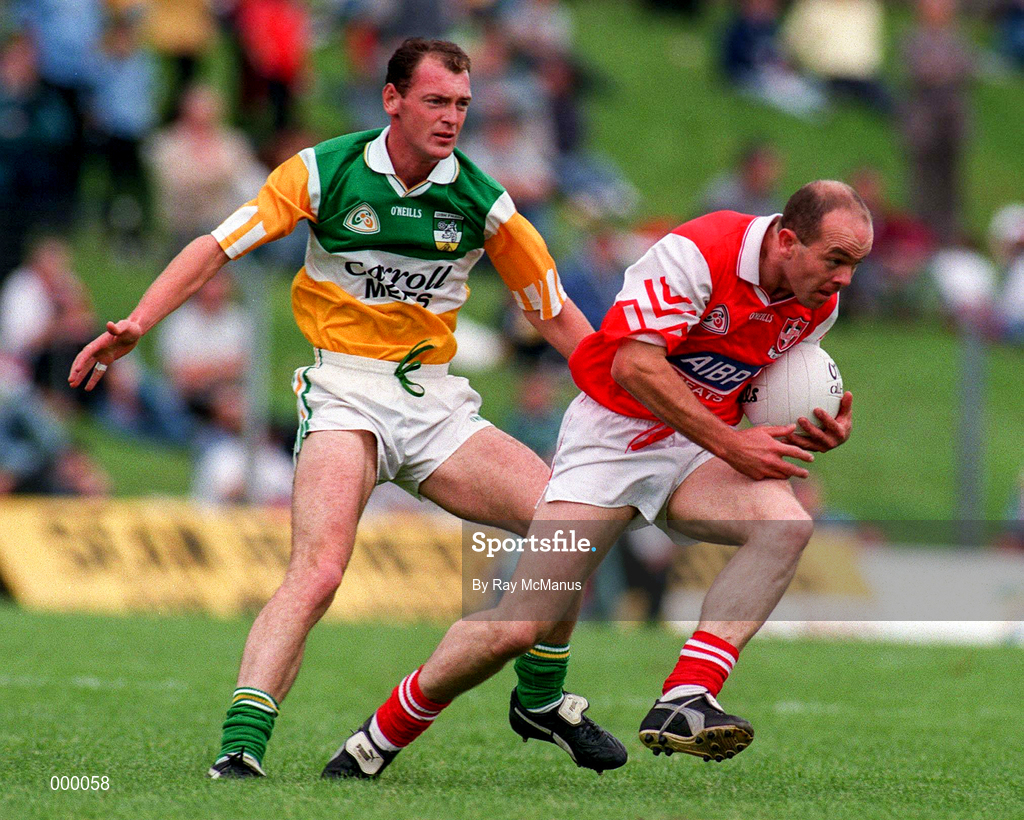 29 June 1997; Alan Rooney of Louth in action against John Kenny of Offaly during the Leinster GAA Senior Football Championship Semi-Final match between Offaly and Louth at Páirc Tailteann in Navan, Meath. Photo by Ray McManus/Sportsfile
