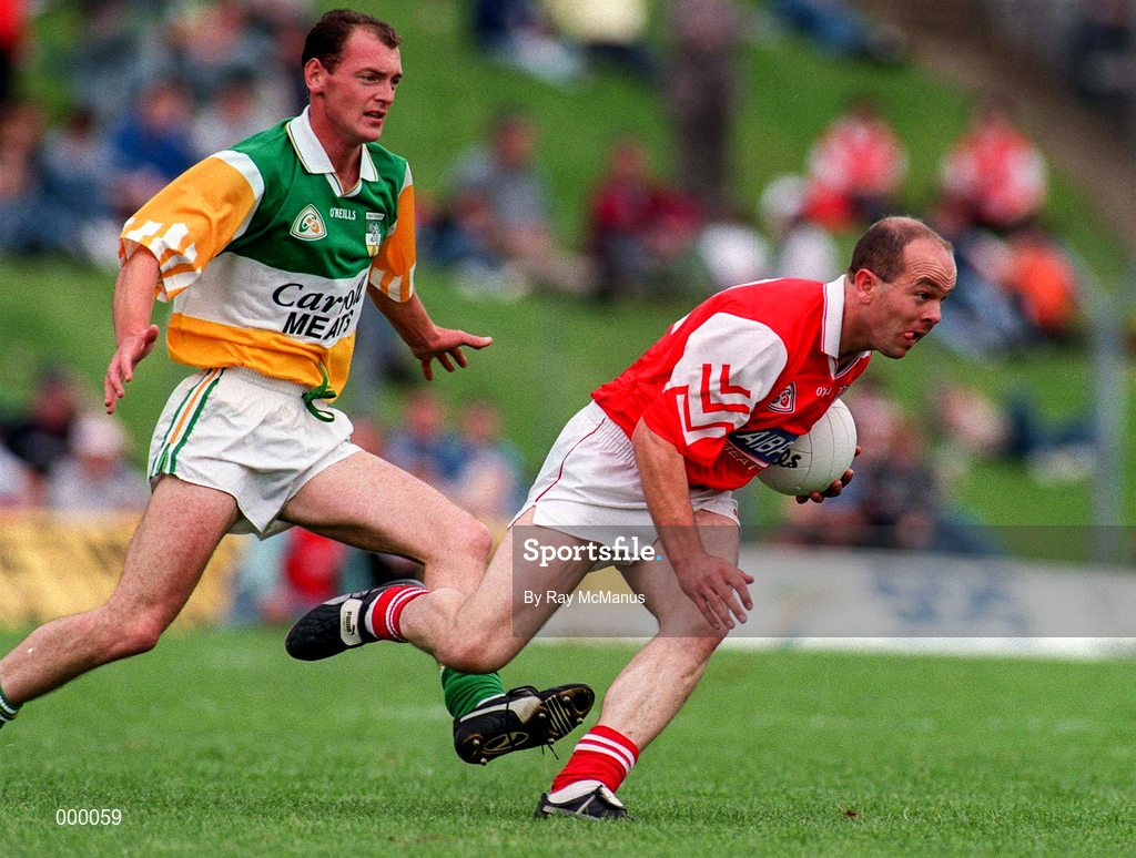 29 June 1997; Alan Rooney of Louth in action against John Kenny of Offaly during the Leinster GAA Senior Football Championship Semi-Final match between Offaly and Louth at Páirc Tailteann in Navan, Meath. Photo by Ray McManus/Sportsfile