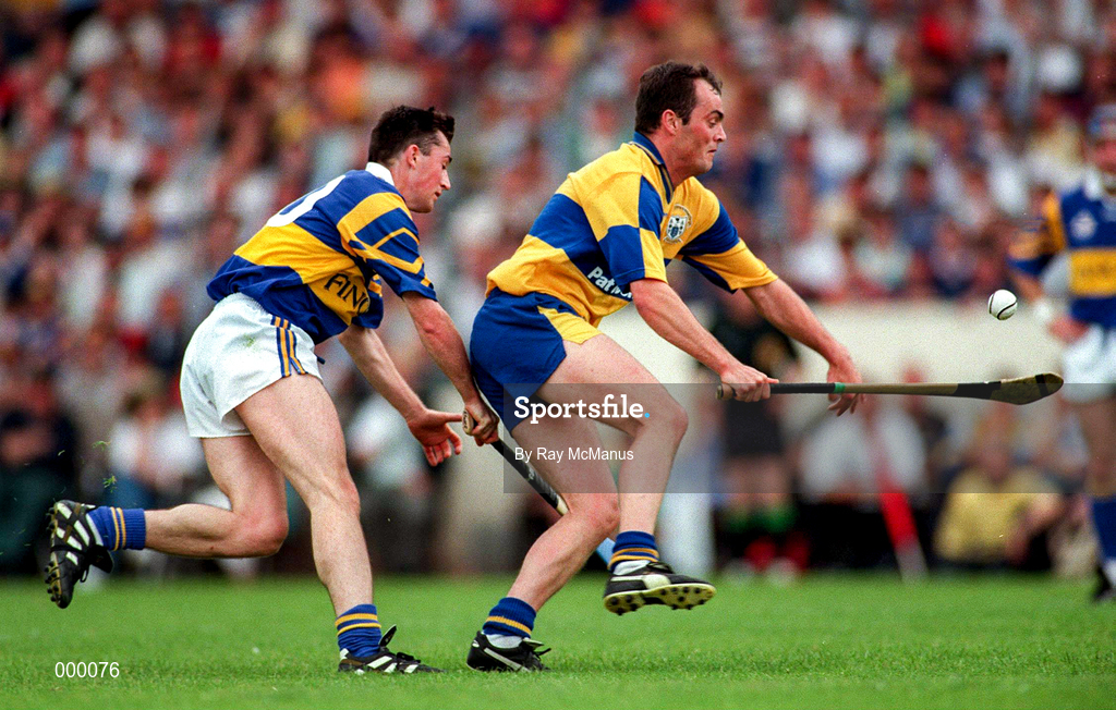 6 July 1997; Anthony Daly of Clare in action against Kevin Tucker of Tipperary during the GAA Munster Senior Hurling Championship Final match between Clare and Tipperary at Páirc Uí Chaoimh in Cork. Photo by Ray McManus/Sportsfile