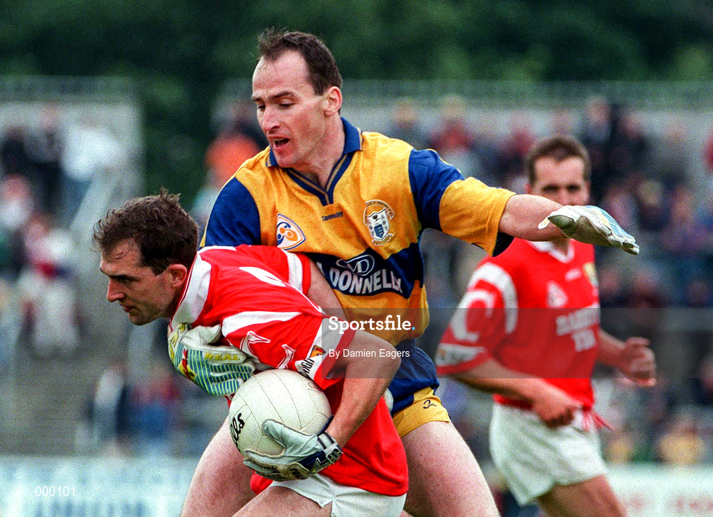 22 June 1997; Barry Murphy of Cork in action against Fraincis McInerney of Clare during the GAA Munster Senior Football Championship Semi-Final match between Clare and Cork at Cusack Park in Ennis, Co Clare. Photo by Damien Eagers/Sportsfile