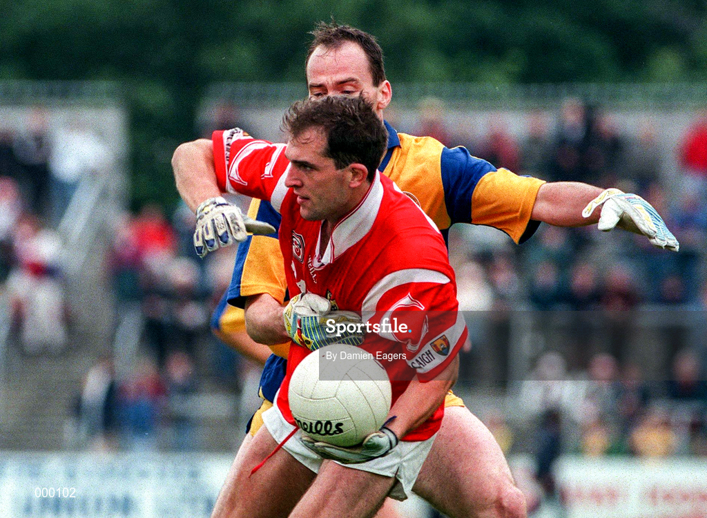 22 June 1997; Barry Murphy of Cork in action against Fraincis McInerney of Clare during the GAA Munster Senior Football Championship Semi-Final match between Clare and Cork at Cusack Park in Ennis, Co Clare. Photo by Damien Eagers/Sportsfile