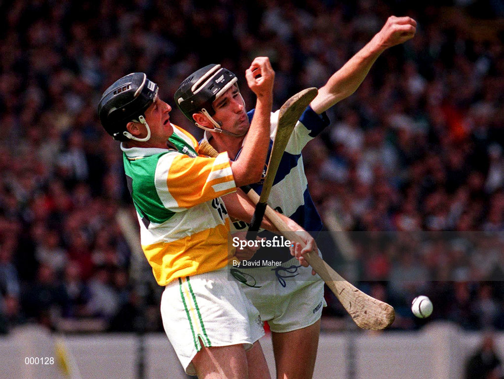 8 June 1997; Billy Dooley of Offaly in action against Paul Cuddy of Laois during the GAA Leinster Senior Hurling Championship Quarter-Final match between Offaly and Laois at Croke Park in Dublin. Photo by David Maher/Sportsfile