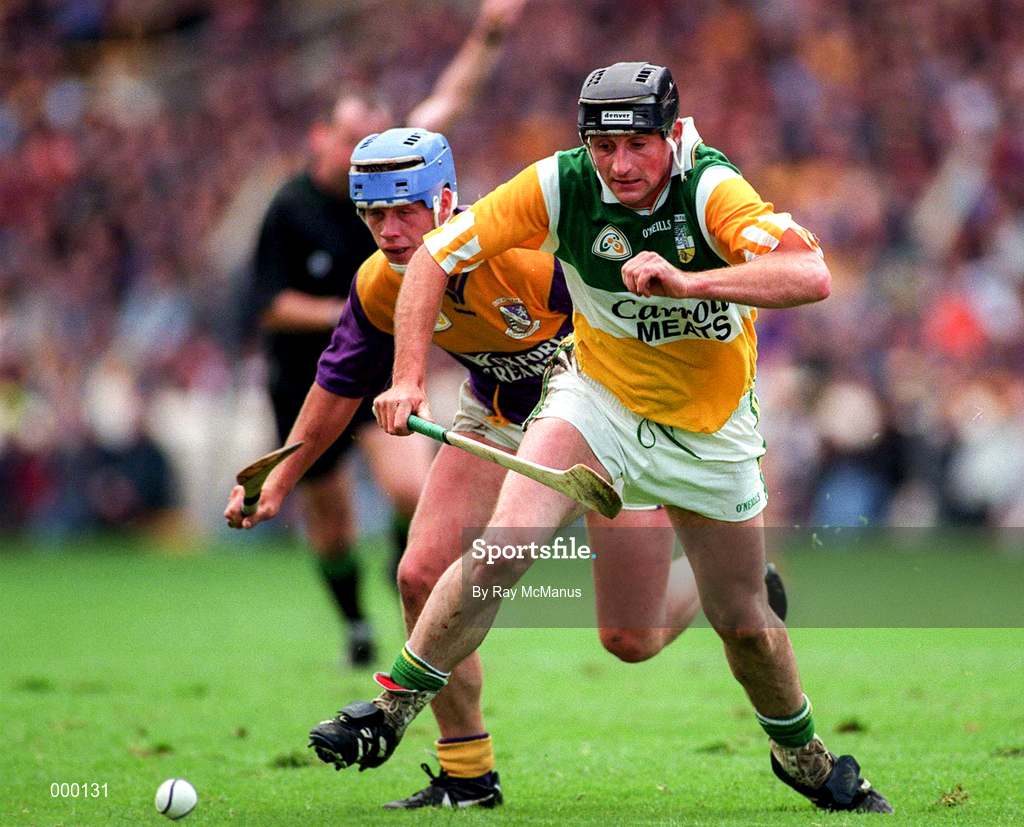 22 June 1997; Billy Dooley of Offaly in action against Eugene Furlong of Wexford during the GAA Leinster Senior Hurling Championship Semi-Final match between Wexford and Offaly at Croke Park in Dublin. Photo by Ray McManus/Sportsfile