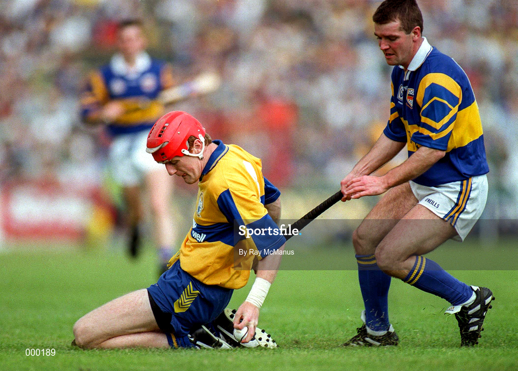 6 July 1997; Brian Lohan of Clare in action against Michael Cleary of Tipperary during the GAA Munster Senior Hurling Championship Final match between Clare and Tipperary at Páirc Uí Chaoimh in Cork. Photo by Ray McManus/Sportsfile
