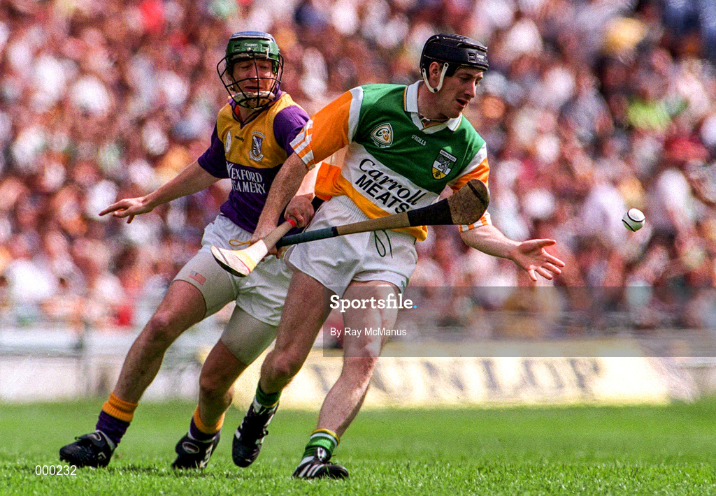 14 July 1996; Brian Whelahan of Offaly in action against Larry Murphy of Wexford during the GAA Leinster Senior Hurling Championship Final match between Wexford and Offaly at Croke Park in Dublin. Photo by Ray McManus/Sportsfile