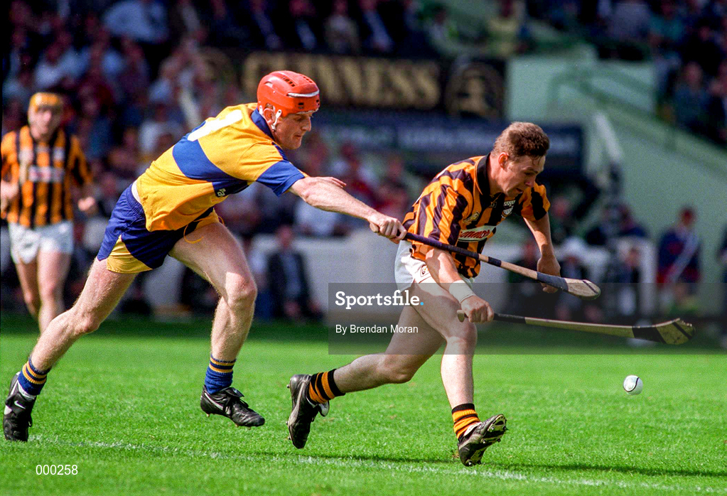 10 August 1997; Charlie Carter of Kilkenny in action against Brian Lohan of Clare during the GAA All-Ireland Senior Hurling Championship Semi-Final match between Clare and Kilkenny at Croke Park in Dublin. Photo by Brendan Moran/Sportsfile