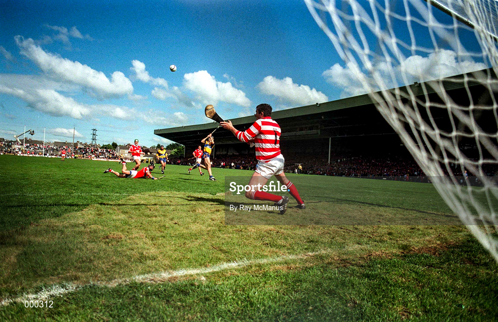 8 June 1997; Steven McDonagh of Clare blasts the ball past goalkeeper, Ger Cunningham of Cork, to score the decisive goal during the GAA Munster Senior Hurling Championship Semi-Final match between Clare and Cork at the Gaelic Grounds in Limerick. Photo by Ray McManus/Sportsfile