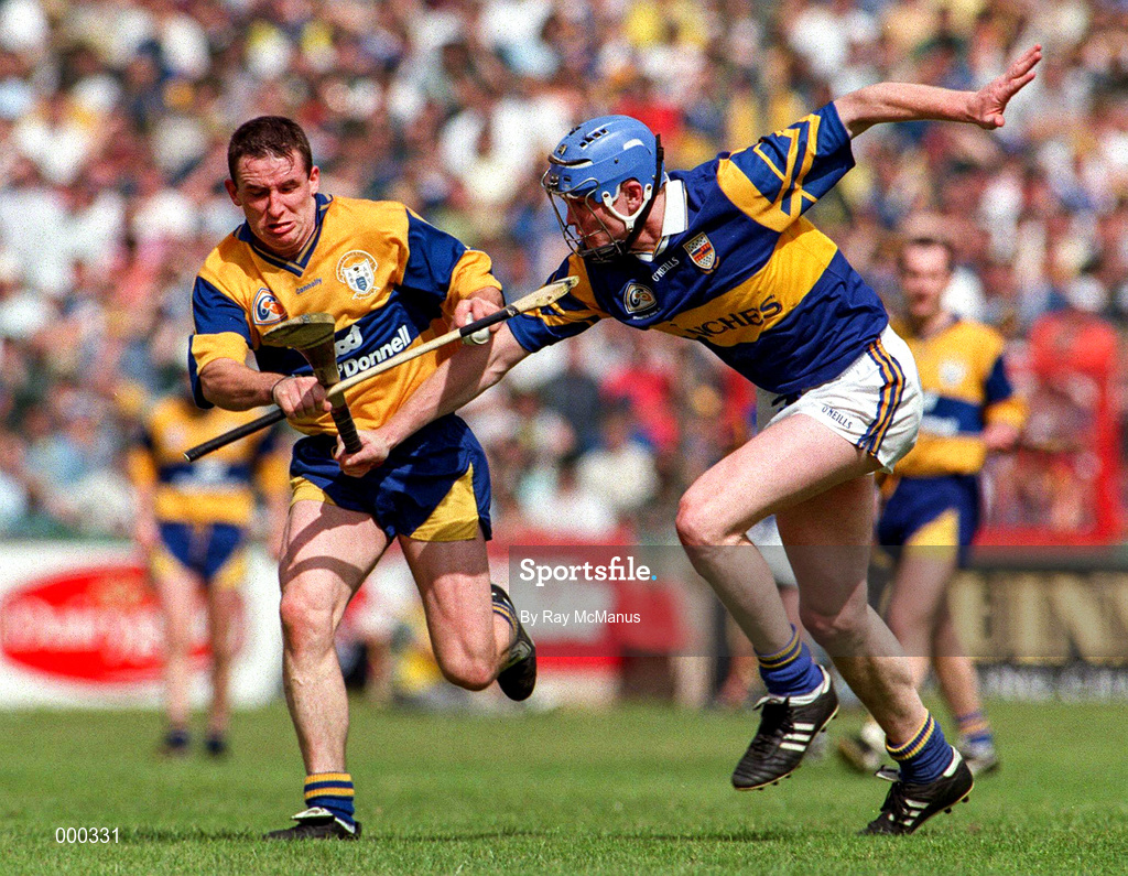 6 July 1997; Colin Lynch of Clare in action against Conor Gleeson of Tipperary during the GAA Munster Senior Hurling Championship Final match between Clare and Tipperary at Páirc Uí Chaoimh in Cork. Photo by Ray McManus/Sportsfile