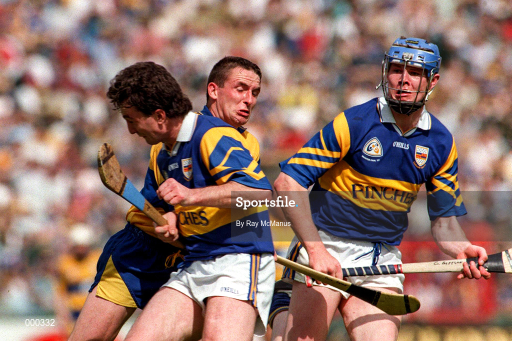 6 July 1997; Colin Lynch of Clare in action against Michael Ryan and Conor Gleeson, right, of Tipperary during the GAA Munster Senior Hurling Championship Final match between Clare and Tipperary at Páirc Uí Chaoimh in Cork. Photo by Ray McManus/Sportsfile