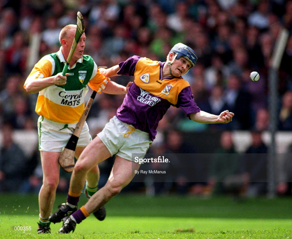 22 June 1997; John Troy of Offaly in action against Colm Kehoe of Wexford during the GAA Leinster Senior Hurling Championship Semi-Final match between Wexford and Offaly at Croke Park in Dublin. Photo by Ray McManus/Sportsfile