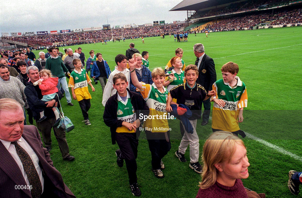 22 June 1997; Patrons of the new stand make their way along the sideline to the Hogan stand after the game was stopped by referee Pat Aherne for a few minutes during the Leinster Senior Hurling Championship Semi-Final match between Kilkenny and Dublin at Croke Park in Dublin. Photo by Ray McManus/Sportsfile