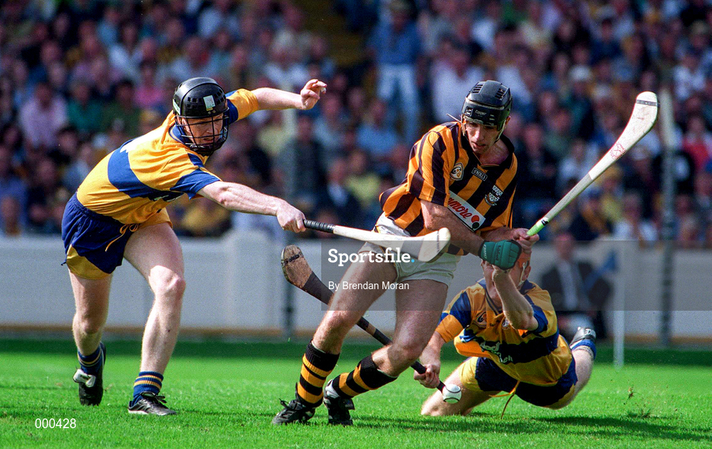 10 August 1997; DJ Carey of Kilkenny in action against Frank Lohan, left, and Brian Lohan of Clare during the GAA All-Ireland Senior Hurling Championship Semi-Final match between Clare and Kilkenny at Croke Park in Dublin. Photo by Brendan Moran/Sportsfile