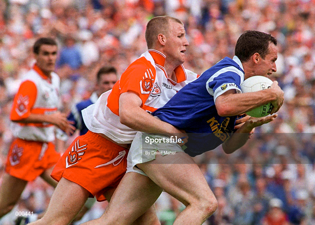 20 July 1997; Damien O'Reilly of Cavan in action against Johnny McBride of Derry during the Ulster GAA Football Senior Championship Final match between Cavan and Derry at St. Tiernach's Park in Clones, Monaghan. Photo by David Maher/Sportsfile