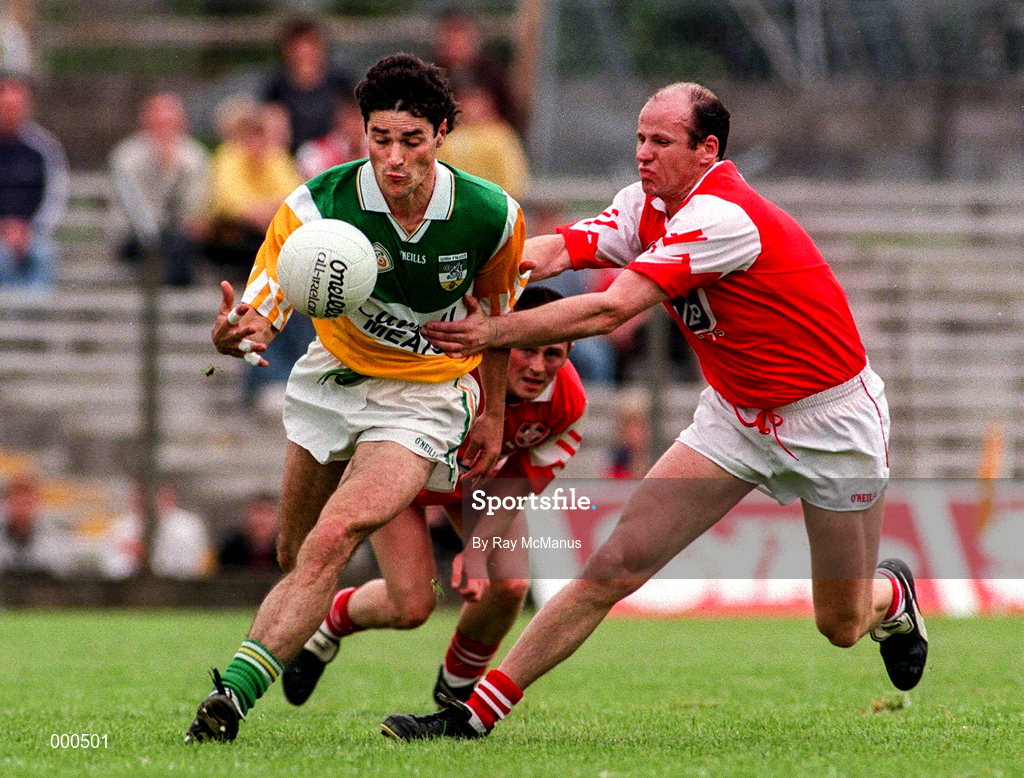 29 June 1997; David Reynolds of Offaly in action against Stephen Melia of Louth during the Leinster GAA Senior Football Championship Semi-Final match between Offaly and Louth at Páirc Tailteann in Navan, Co Meath. Photo by Ray McManus/Sportsfile