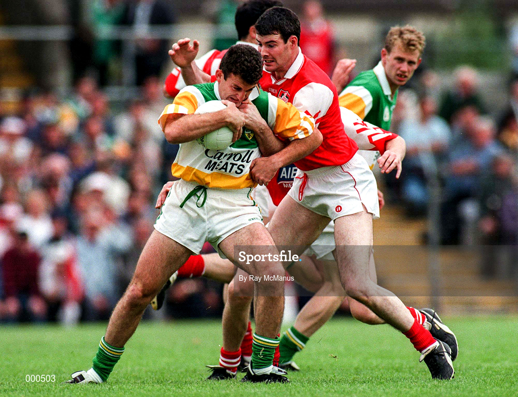29 June 1997; David Reynolds of Offaly in action against Gerry Curran of Louth during the Leinster GAA Senior Football Championship Semi-Final match between Offaly and Louth at Páirc Tailteann in Navan, Co Meath. Photo by Ray McManus/Sportsfile