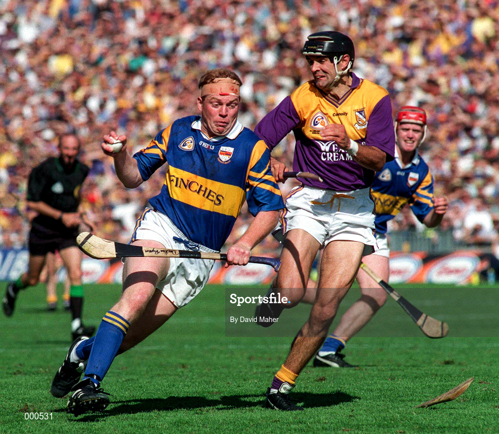 17 August 1997; Declan Ryan of Tipperary in action against John O'Connor of Wexford during the GAA All-Ireland Senior Hurling Championship Semi-Final match between Tipperary and Wexford at Croke Park in Dublin. Photo by David Maher/Sportsfile