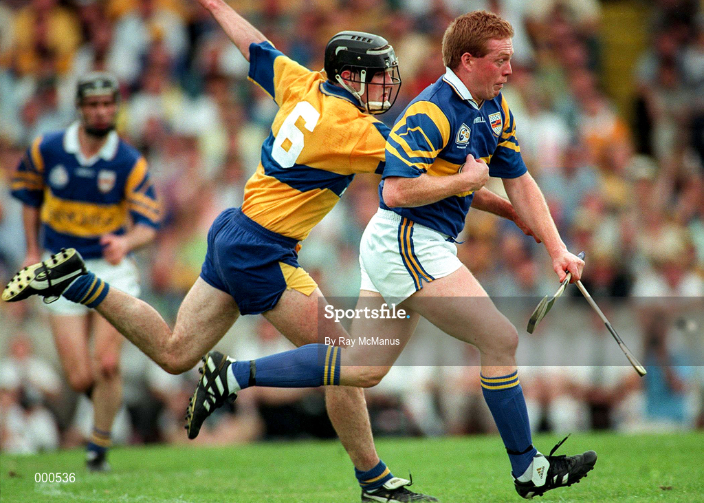 6 July 1997; Declan Ryan of Tipperary gets away from Sean McMahon of Clare during the GAA Munster Senior Hurling Championship Final match between Clare and Tipperary at Páirc Uí Chaoimh in Cork. Photo by Ray McManus/Sportsfile