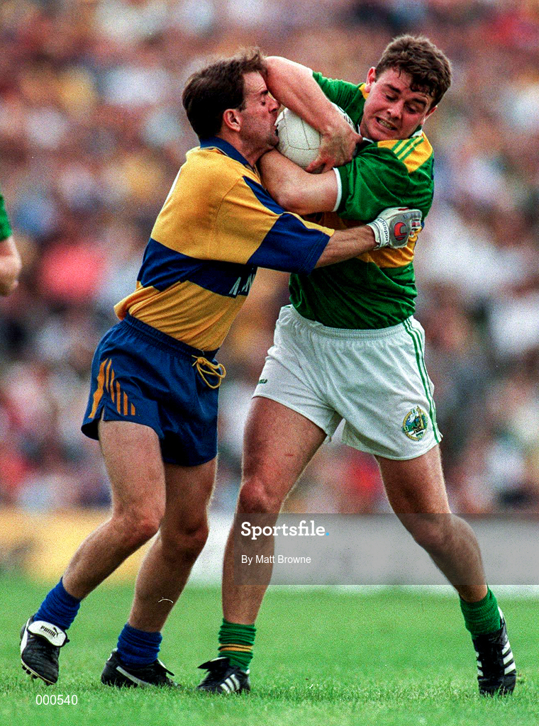 20 July 1997; Denis O'Dwyer of Kerry in action against John Enright of Clare during the GAA Munster Senior Football Championship Final match between Kerry and Clare at LIT Gaelic Grounds in Limerick. Photo by Matt Browne/Sportsfile