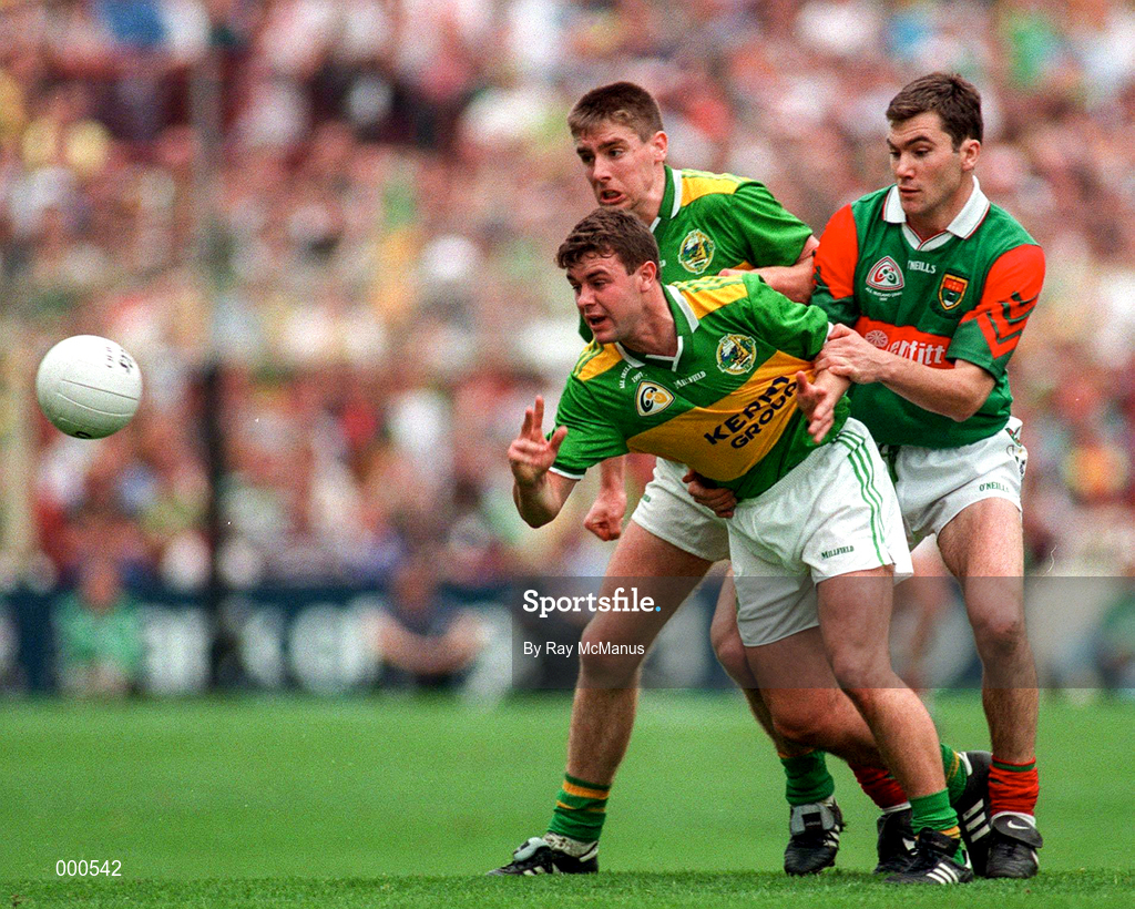 27 September 1997; Dennis O'Dwyer of Kerry is tackled by James Horan of Mayo during the GAA Football All-Ireland Senior Championship Final match between Kerry and Mayo at Croke Park in Dublin. Photo by Ray McManus/Sportsfile