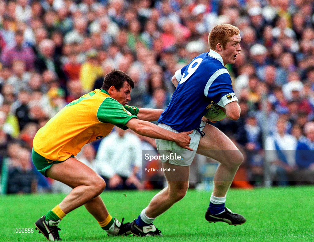 22 June 1997; Dermot McCabe of Cavan in action against John Joe Doherty of Donegal during the Ulster GAA Football Senior Championship Semi-Final match between Cavan and Donegal at St Tiernach's Park in Clones, Monaghan. Photo by David Maher/Sportsfile