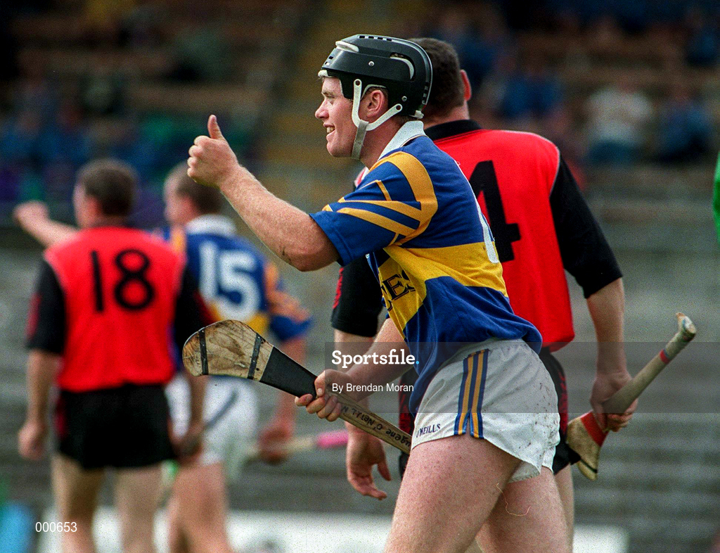 26 July 1997; Eugene O'Neill of Tipperary celebrates his goal during the GAA All-Ireland Senior Hurling Championship Quarter-Final match between Tipperary and Down at St. Tiernach's Park in Clones, Monaghan. Photo by Brendan Moran/Sportsfile
