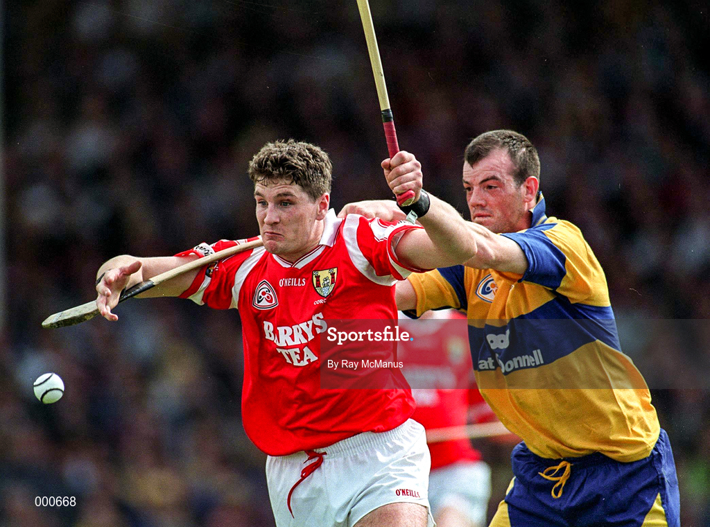 8 June 1997; Fergal McCormack of Cork in action against Ollie Baker of Clare during the GAA Munster Senior Hurling Championship Semi-Final match between Clare and Cork at the Gaelic Grounds in Limerick. Photo by Ray McManus/Sportsfile