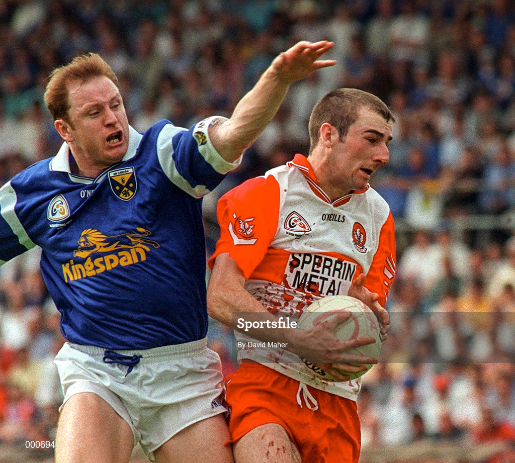 20 July 1997; Fintan Cahill of Cavan in action against David O'Neill of Derry during the Ulster GAA Football Senior Championship Final match between Cavan and Derry at St. Tiernach's Park in Clones, Monaghan. Photo by David Maher/Sportsfile