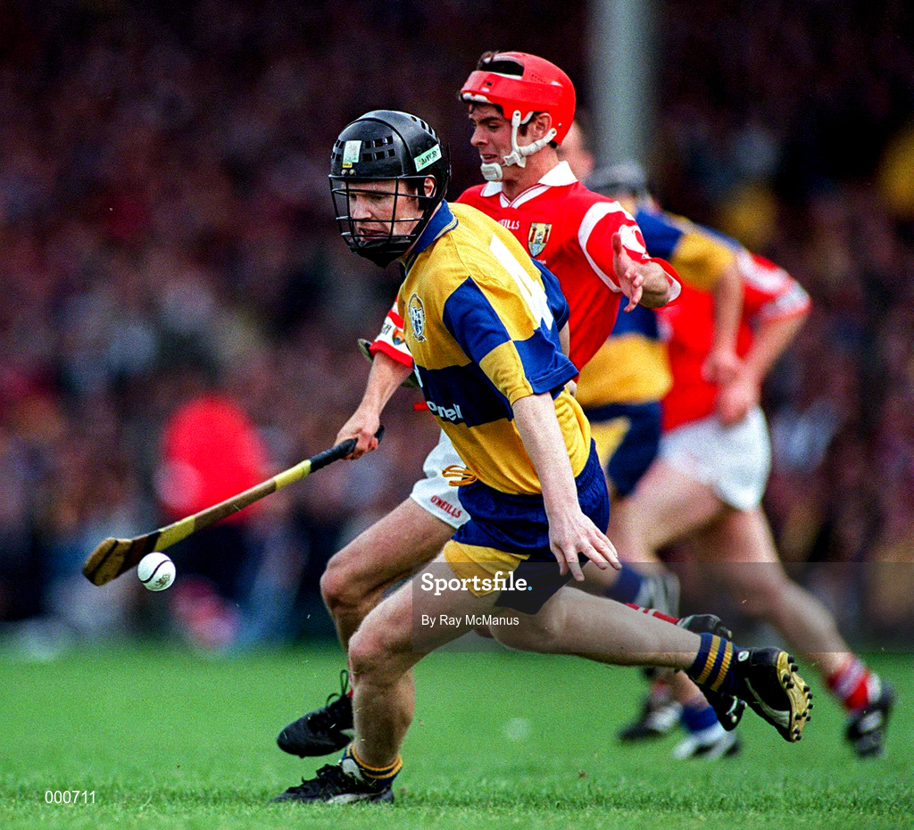 8 June 1997; Frank Lohan of Clare in action against Sean McGrath of Cork during the GAA Munster Senior Hurling Championship Semi-Final match between Clare and Cork at the Gaelic Grounds in Limerick. Photo by Ray McManus/Sportsfile