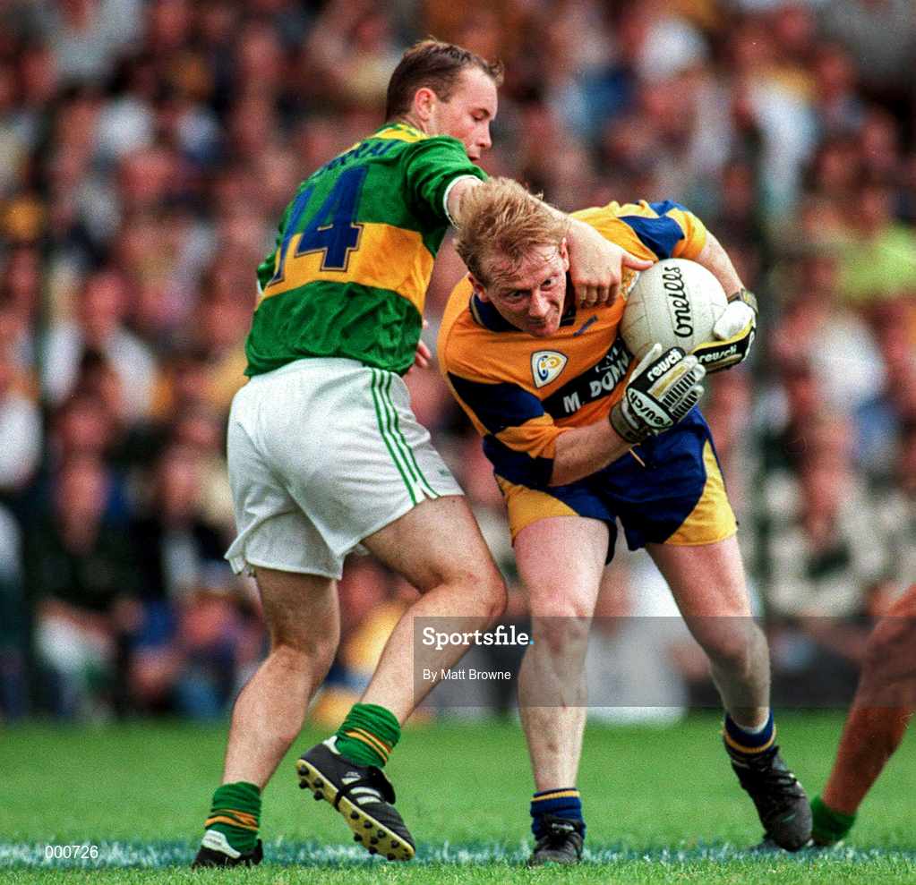 20 July 1997; Frankie Griffin of Clare in action against Brian Clarke of Kerry during the GAA Munster Senior Football Championship Final match between Kerry and Clare at LIT Gaelic Grounds in Limerick. Photo by Matt Browne/Sportsfile