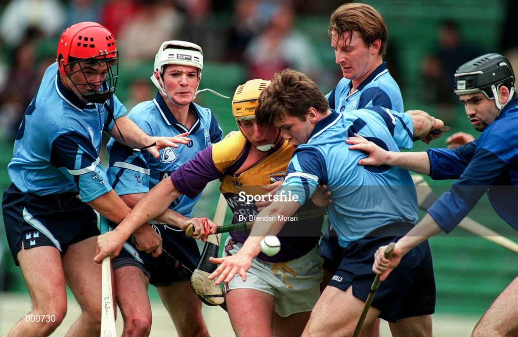 23 June 1996; Garry Laffan of Wexford under pressure from Dublin players from left Sean Power, John Finnegan, Sean Deignan, Derek McCormack and goalkeeper Eamonn Burke, during the Leinster Senior Hurling Championship Semi-Final between Dublin and Wexford at Croke Park in Dublin. Photo by Brendan Moran/Sportsfile