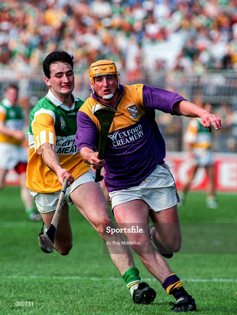 14 July 1996; Garry Laffan of Wexford in action against Kevin Kinahan of Offaly during the GAA Leinster Senior Hurling Championship Final match between Wexford and Offaly at Croke Park in Dublin. Photo by Ray McManus/Sportsfile