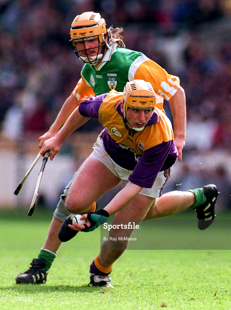 22 June 1997; Garry Laffan of Wexford in action against Ger Oakley of Offaly during the GAA Leinster Senior Hurling Championship Semi-Final match between Wexford and Offaly at Croke Park in Dublin. Photo by Ray McManus/Sportsfile