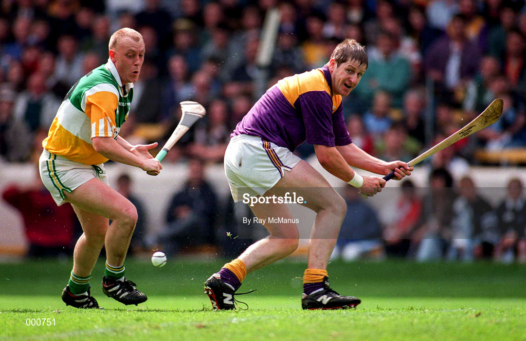 22 June 1997; Ger Cush of Wexford in action against John Troy of Offaly during the GAA Leinster Senior Hurling Championship Semi-Final match between Wexford and Offaly at Croke Park in Dublin. Photo by Ray McManus/Sportsfile