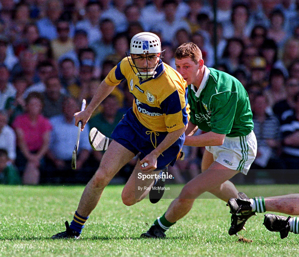 16 June 1996; Ger O'Loughlin of Clare in action against Ciaran Carey of Limerick during the Munster GAA Hurling Senior Championship Semi-Final match between Limerick and Clare at Gaelic Grounds in Limerick. Photo by Ray McManus/Sportsfile