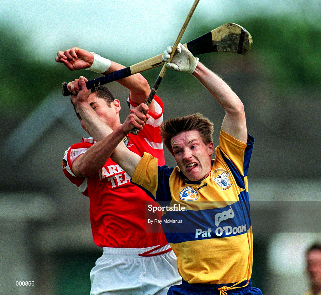8 June 1997; James O'Connor of Clare in action against Seán Óg Ó hAilpín of Cork during the GAA Munster Senior Hurling Championship Semi-Final match between Clare and Cork at the Gaelic Grounds in Limerick. Photo by Ray McManus/Sportsfile