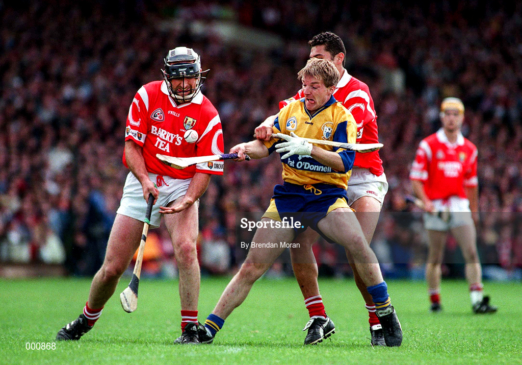 8 June 1997; James O'Connor of Clare in action against Brian Corcoran, right, with, Seán Óg Ó hAilpín of Cork during the GAA Munster Senior Hurling Championship Semi-Final match between Clare and Cork at the Gaelic Grounds in Limerick. Photo by Brendan Moran/Sportsfile