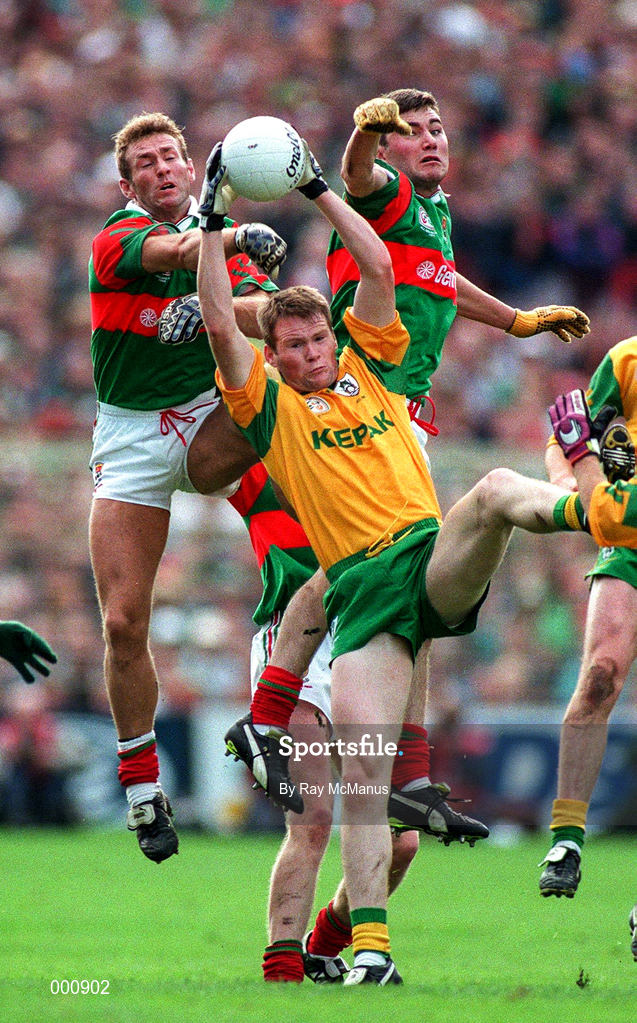 29 September 1996; Action featuring from left Colm McMenamon of Mayo, Jimmy Mc Guinness of Meath,and James Horan of Mayo  during the GAA All-Ireland Senior Football Championship Final replay match between Meath and Mayo at Croke Park in Dublin. Photo by Ray McManus/Sportsfile
